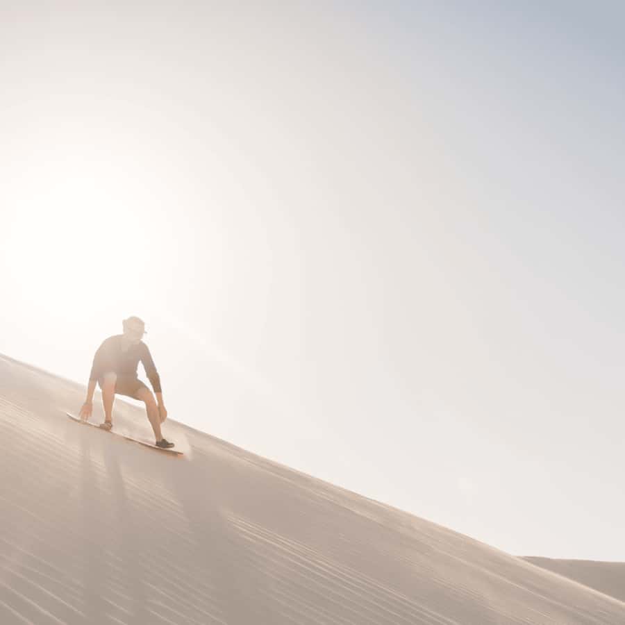 Half-Day Desert Safari For Cruise Ships Passngers. - Sandboarding at the secret stop