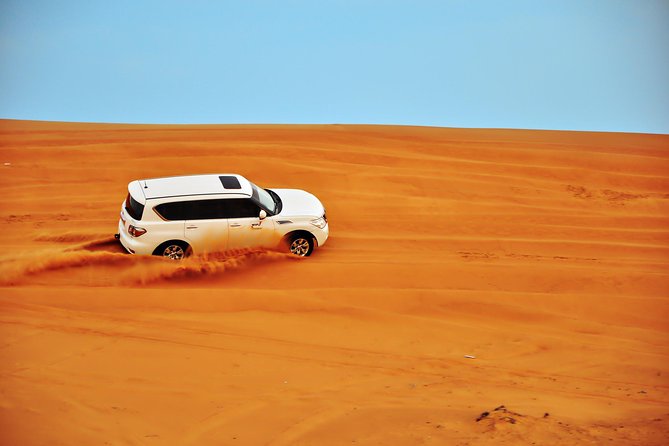 Half Day Desert Safari || Sand Boarding || Camel Ride || Inland Sea Visit || - Dune bashing: choose your level of excitement