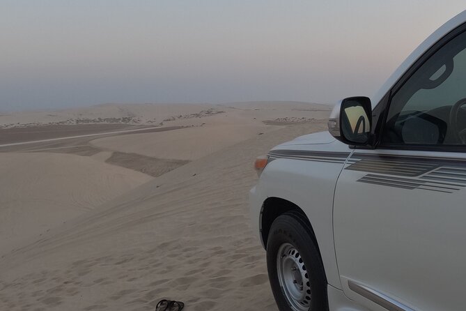 Half Day Safari Tour With Camel Ride and Sand Boarding in Doha - Khor Al Udaid gives the tour its sense of place