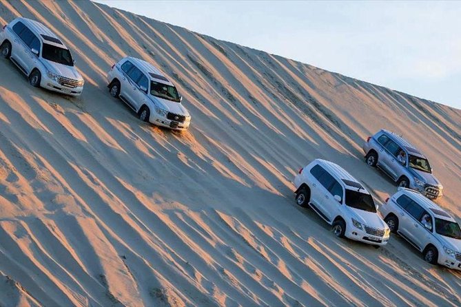 Premium Full-Day Safari, Dune Bash, Camel Ride and BBQ Meal in Desert Camp - Khor Al Udaid, Where Sand Meets the Inland Sea