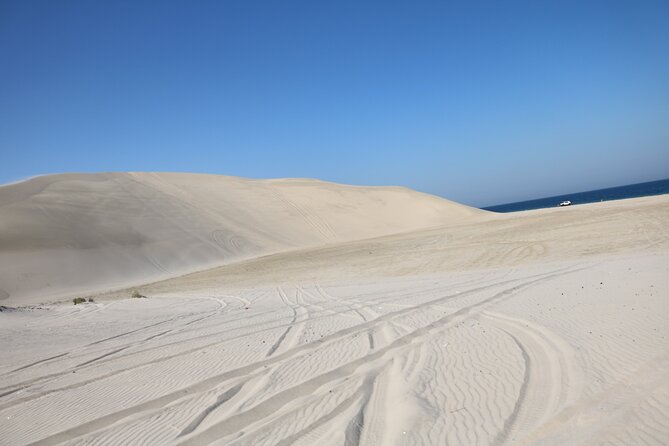 Private Desert Safari Tour 4 hours - Watching the dunes change color at sunrise