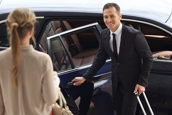 Private Doha Airport Transfer to Doha, Qatar - A private ride for up to four people