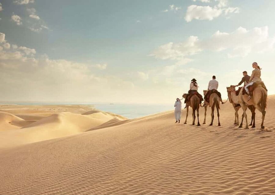 Qatar: ATV & Quad Dune Bashing, Camel Ride, & Sandboarding - Taking the wheel on an ATV