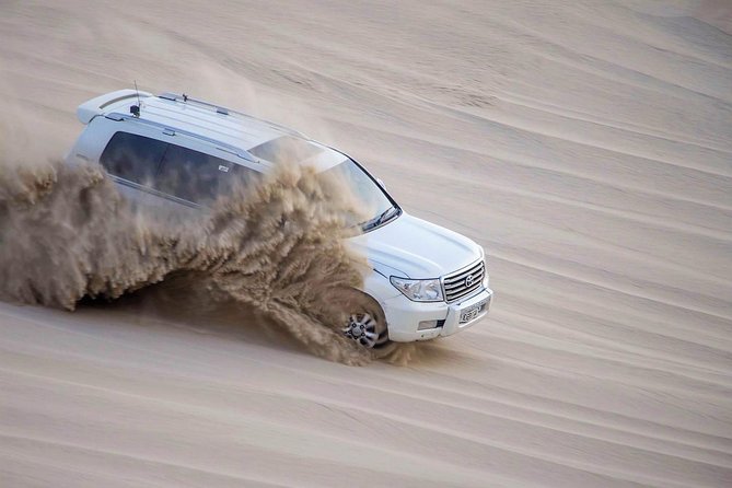 Qatar Gold Dune Safari, Dune Bashing,Camel Ride,Sand Boarding,Inland Sea Desert - Sandboarding on the dunes