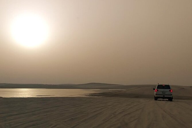 Qatar Sunset Desert Safari: Dune Bashing & Golden Sands Adventure - The camel camp and a short desert introduction