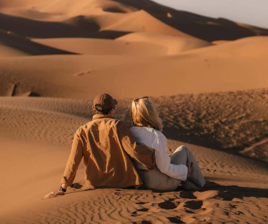 Qatar: Sunset Desert Safari with Camel Ride & Sandboarding - Sandboarding down the dunes