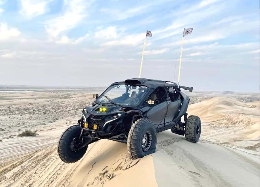 Quad Bike/Buggy, Desert Safari, Camel Ride, Dune Bashing - Red dunes, sharp turns, and dune bashing
