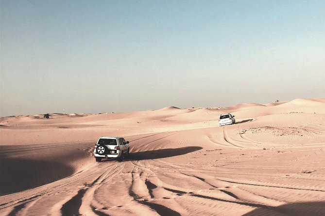 Sunrise Desert Safari in Qatar: An Unforgettable Adventure - Dune bashing, with a side of sandboarding