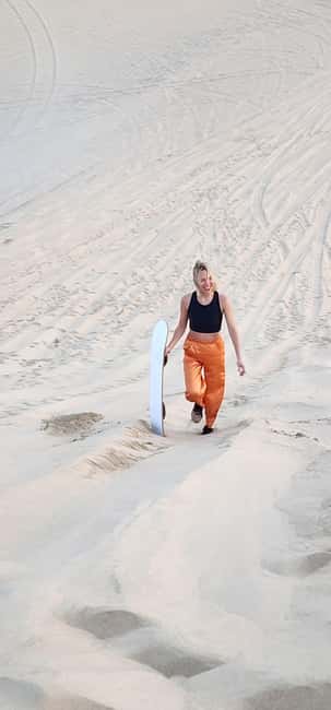 Sunrise or Sunset desert Safari with Sandboarding in Qatar - Sandboarding on Qatar’s Dunes