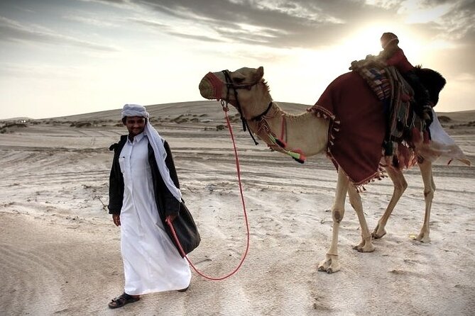 Thrilling 4-Hour Dune Bashing & Camel Ride Safari to Inland Sea - A quick camel ride at the local camp