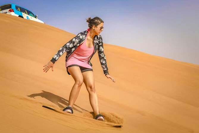 Tranquil Sands A Serene Desert Safari Experience - Sandboarding and the photo stops